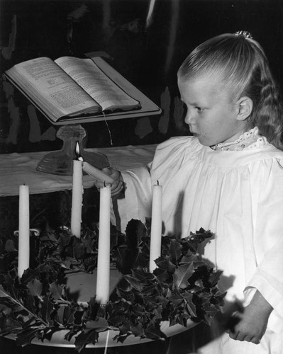 Judy Lentz lights advent candles