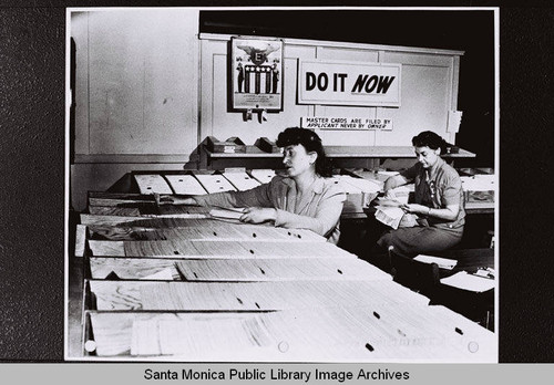 Master survey files of ride share applications are checked daily by clerks Eleanor Barnes and Mildred Timmons at the Douglas Aircraft Company Santa Monica plant as part of the Transportation Program