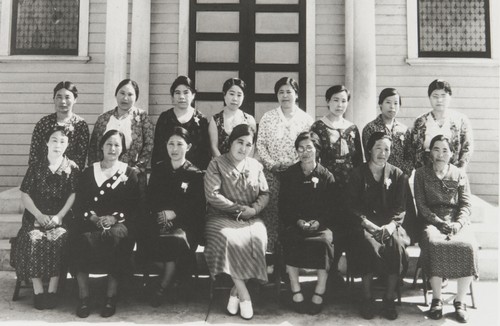 Oxnard Buddhist Church Women's Board of Directors : 1934. Back L-R: Mrs. N. Sakamoto, Mrs. A. Mine, Mrs. M. Moriwaki, Mrs. I. Taketa. Mrs. Suzuki, Mrs. Kurihara, Mrs. Otsuki, Mrs. S. Kanda. Front: Mrs. Kawamoto, Mrs. Kodani, Mrs. Y. Shiozaki, Mrs. Masanaga, Mrs. M. Kanamori, Mrs. Hashimoto, Mrs. Fujimoto