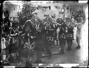 A line of dancing braves in the Hopi Snake Dance Ceremony at its height, Oraibi, Arizona, ca.1898