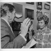 Doreen Marshall, chairman of the Council on Intergovernmental Relations, takes the oath of office from Governor Ronald Reagan