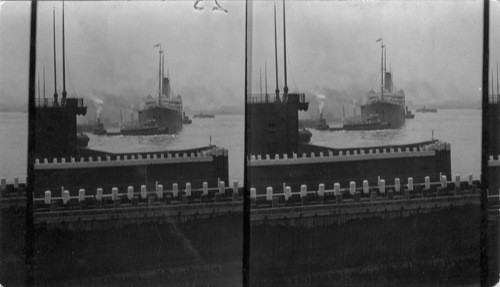 French Steamer Coming from Europe and Going in it's dock, being helped by tug boats, New York City, N.Y