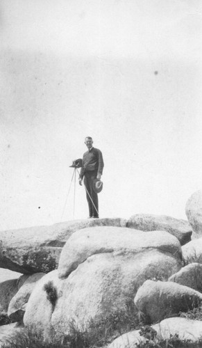 Andrew P. Hill, Jr. in Carmel, with camera on tripod