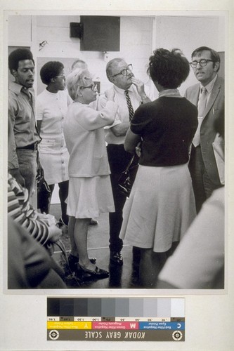 Patricia Crocker, Principal, Francis Hurst, maintenance co-ordinator, Jim Ballard, AFT President, Unidentified mother. Sir Francis Drake Annex inspection tour