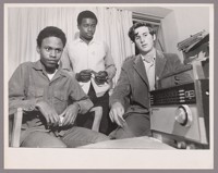 Draft Lottery. Shelton Bunn (#131), Roosevelt Alexander (#264), Mike Boland (#1), listening to radio broadcast of lottery in Phelan Hall, USF
