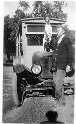 Charles McCord with his dog and delivery truck