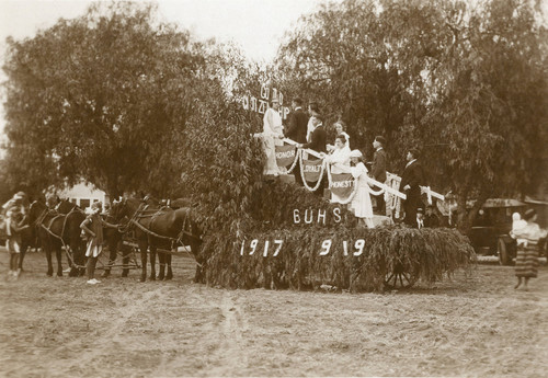 Banning Union High School horse-drawn float in parade in downtown Banning, California in 1917-1919
