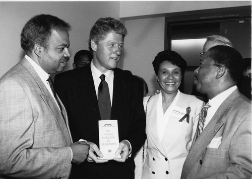 Bill Clinton talking with others, Los Angeles, ca. 1993