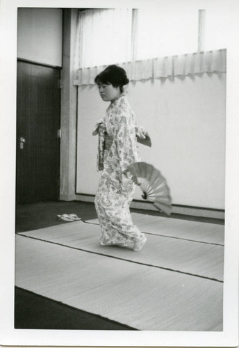 Student dancing in traditional Japanese garments