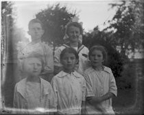 Group portrait of five children outside, c. 1912