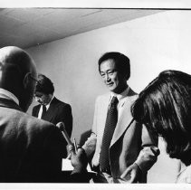 Melvin S. Hing, standing at microphone. He was a longtime Sacramento County employee, CFO, later Acting County Executive for Sacramento County (late 1970s) and (1978-1989) Alameda County Executive