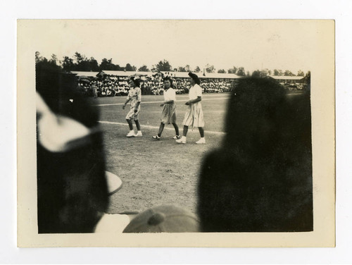 Girls at baseball game in Jerome camp
