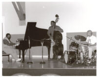 Cyrus Chestnut and two unidentified musicians performing, Los Angeles [descriptive]