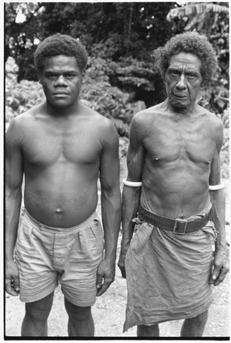 Geni'ilefana and young man, probably taken behind 'Oloburi Harbour