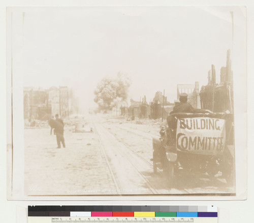 Down Market St. April 1906. S.F. Cal. [Demolition of unidentified building in distance; "Building Committee" banner on truck, foreground.]