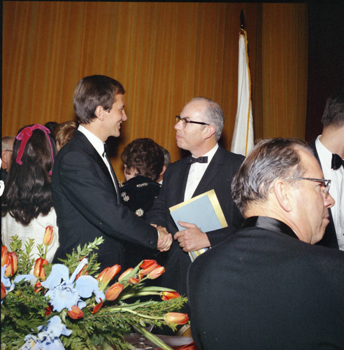 Pat Boone in discussion at Pepperdine's Birth of a College dinner, 1970