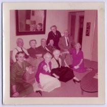 Group portrait of Prusch family at party