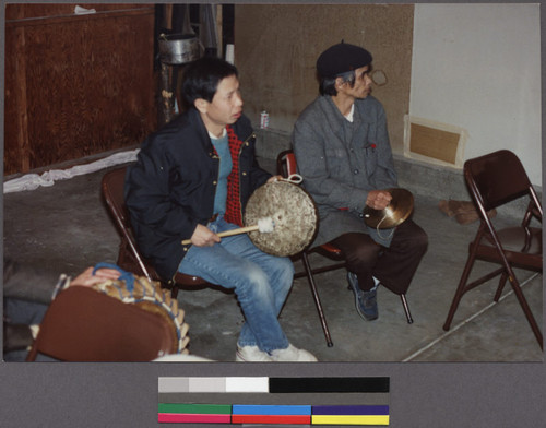 Musicians playing at Mien ceremony for the first anniversary of a death, Richmond, California