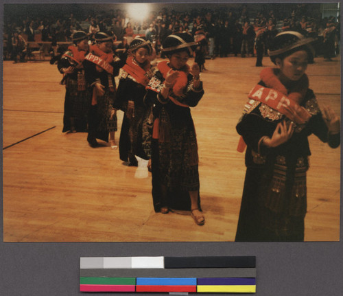 Mien dancers performing at a cultural event