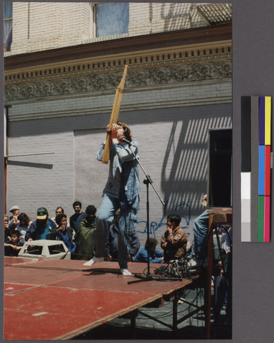 Former Peace Corps volunteer playing the khene at a street fair in San Francisco's Tenderloin district