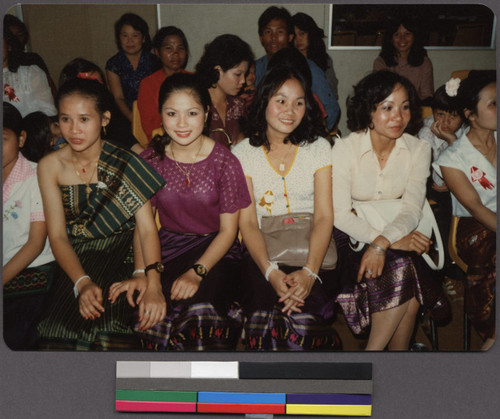 Group of ladies sitting at a New Year's party, San Jose, California