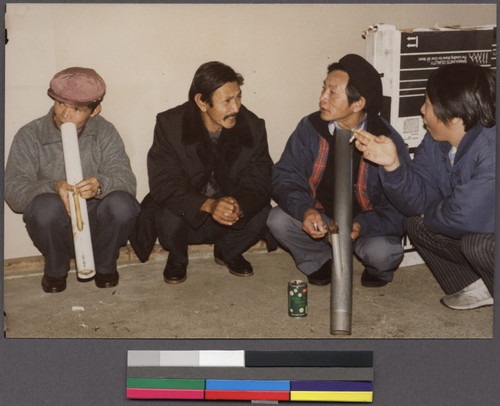 Group of men smoking