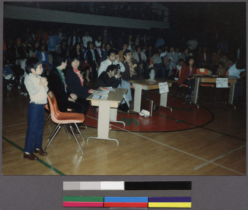 Group of people sitting at a singing festival