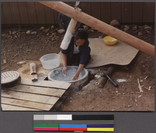 Khmu woman making Lao noodles, Redding, California