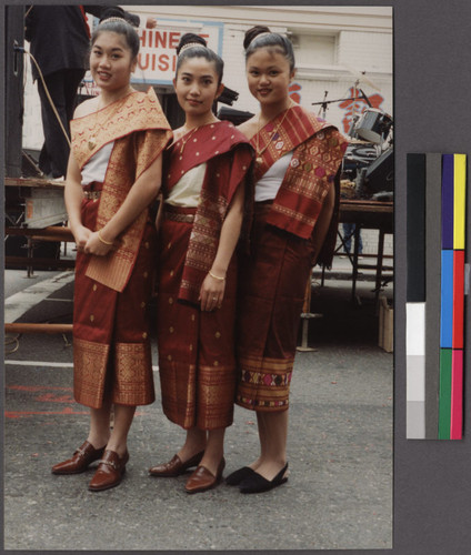 Three Lao girls in traditional clothing, Northern California