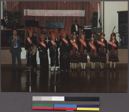 Youths on stage at a cultural event