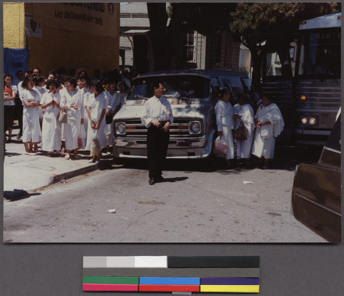 Women at funeral for head monk at the Lao Oakland temple