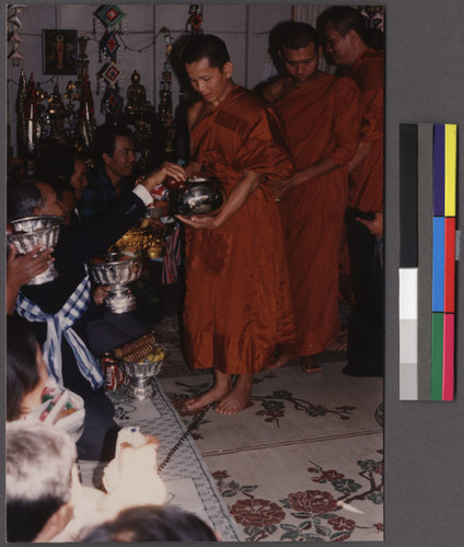 Making offerings to Buddhist monks, Stanislaus County, California