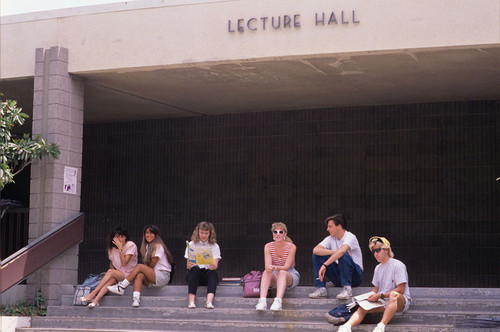 Students sitting on Lecture Hall steps, 1989