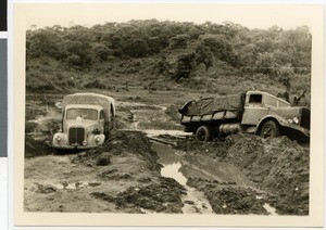 Two trucks crossing a ford, Ethiopia, 1954