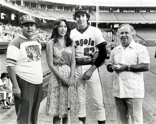 Miss Angels 1980 Tina Baca with councilmembers at Angels Stadium