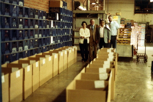 Commerce employees distributing food