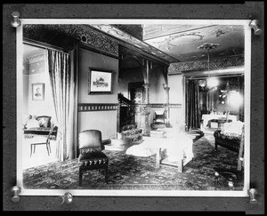 Interior view of the Shatto residence, showing a sitting area near a staircase, ca.1900