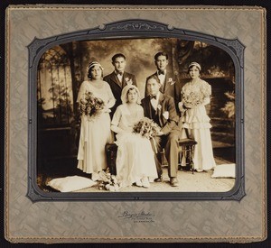 A large format cabinet photo of a Latino wedding party, circa 1920s