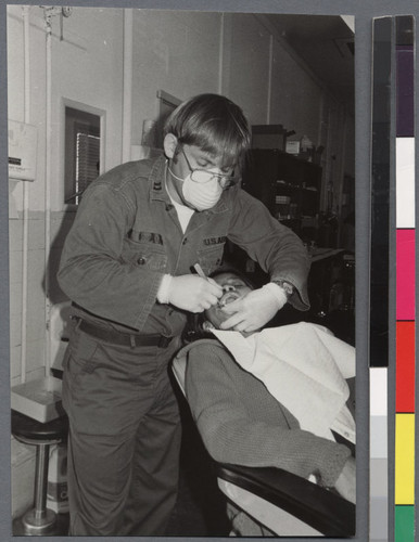 Dentist working on patient