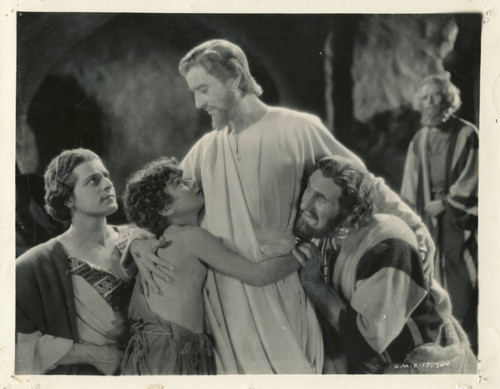 Apostles embrace the risen Christ in "The King of Kings" (1927)