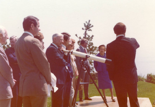 President Banowsky pointing to something on the Seaver College campus, Mrs. Seaver (L)