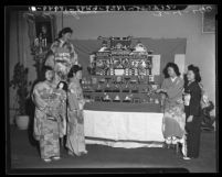 Women with display at Japanese Doll Festival in Little Tokyo, Los Angeles, Calif., 1940