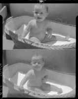 Baby Rosita Dee Cornell sitting in a basket, California, 1931
