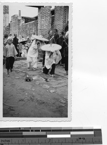 A funeral procession at Luoding, China, 1937