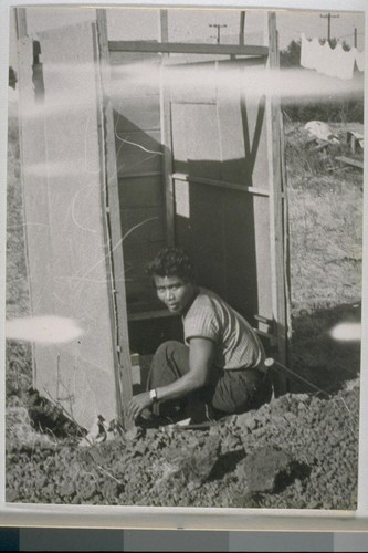 Typical privies - scores of them have been hurriedly erected - that serve Richmond Shipyard workers. Other families, living within a block or two of brush-lined Richmond "creeks" that are dry at this time of year, use the gravelled creek beds as latrines. After heavy rains, these lowlands overflow