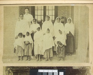 Woman missionary and pupils, Punjab, Pakistan, ca.1900