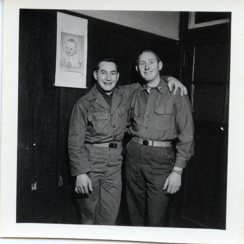Two servicemen posing at Camp Drake