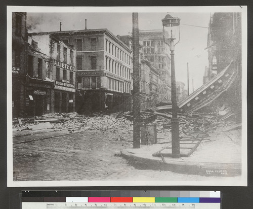 [Ruins and rubble along Commercial St.]
