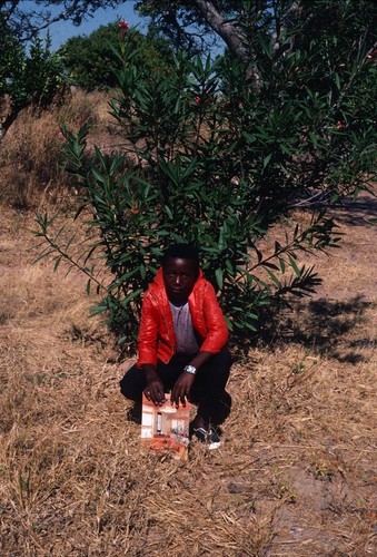 A son of Paul Nsama, near his home, Nsama village