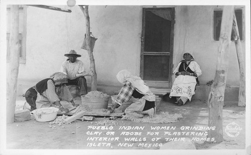 Pueblo Indian Women Grinding Clay or Adobe for Plastering Interior Walls of Their Homes, Isleta, New Mexico